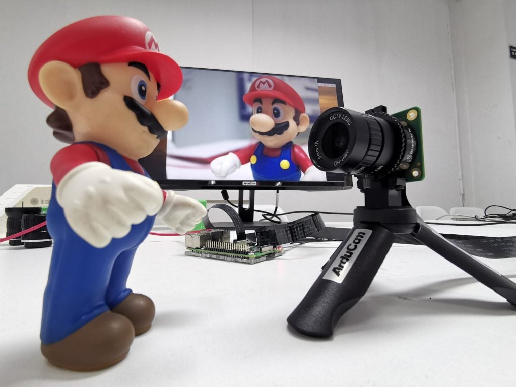 raspberry pi high quality hq camera on tripod cs mount lens